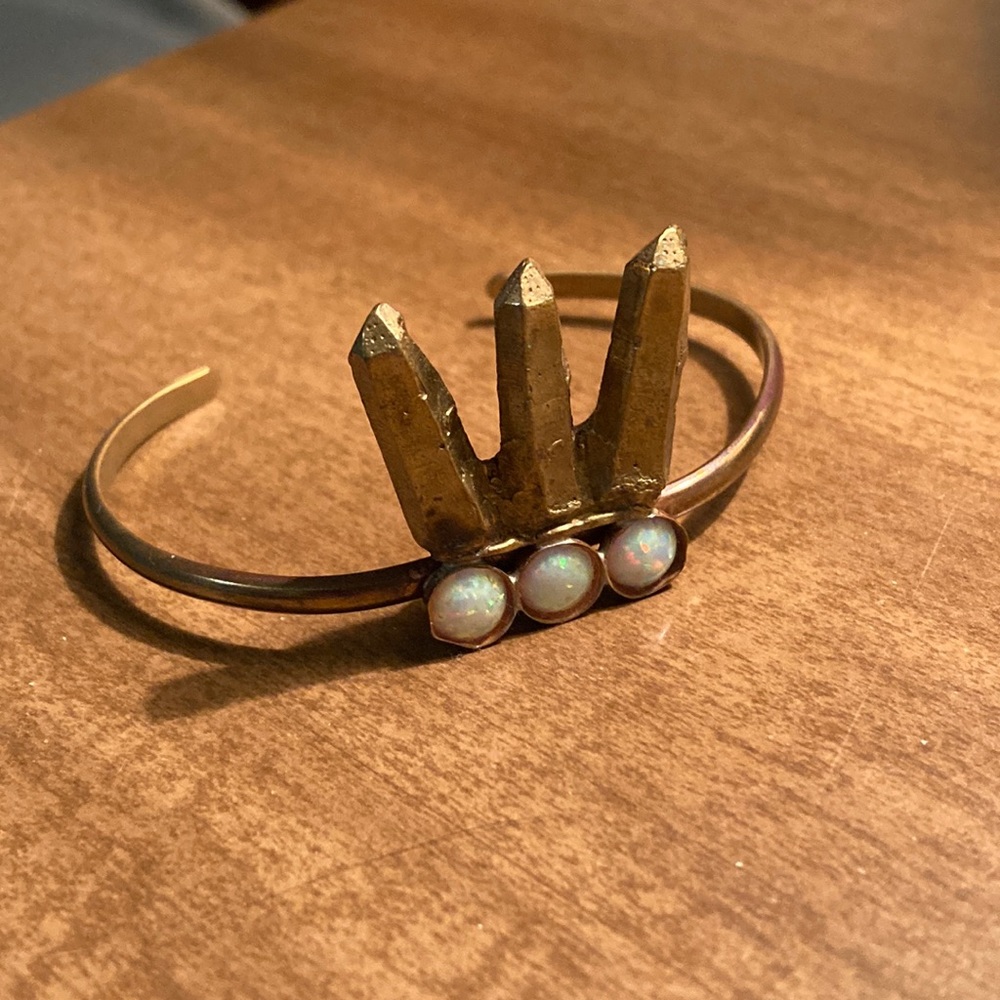 Brass cuff with three opals